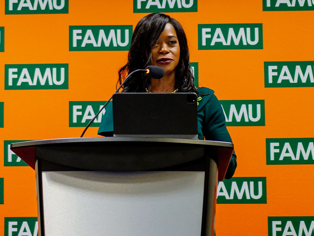 President-Elect Marva Johnson poised at the podium while thanking legislators for milestone appropriation year