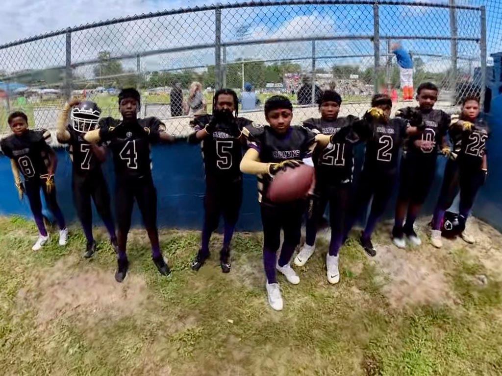 The football team gathers for a picture