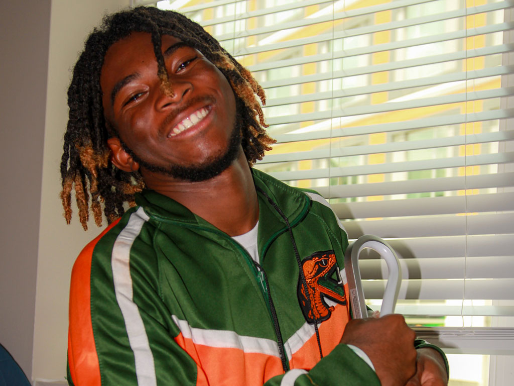 Ricky II beams a bright smile of happiness