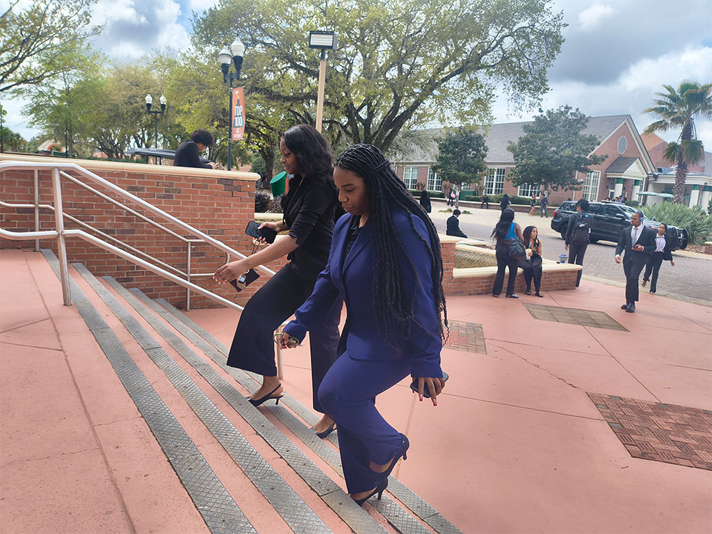Students arrive at Lee Hall for Florida A&M University’s School of Business and Industry forum, where industry leaders engage students in professional development and career insights.