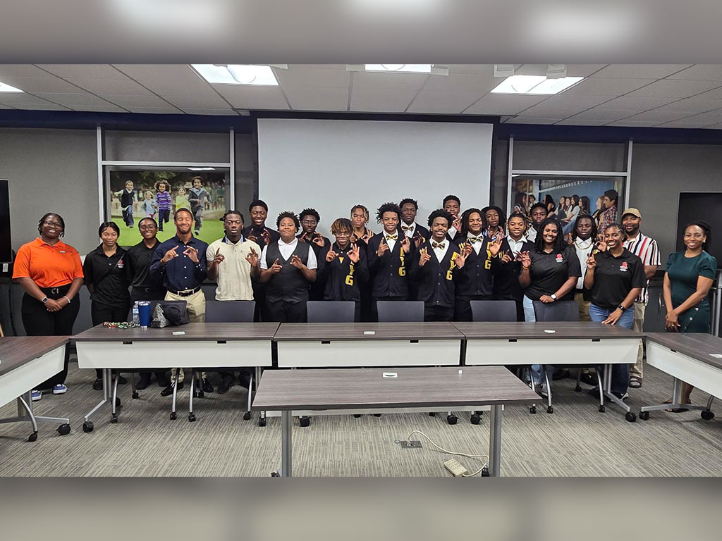 SFEPD student ambassadors and participants gather in the School of Business and Industry during a financial literacy workshop, where students shared strategies on budgeting, credit management and wealth-building as part of the Ripple Effects initiative at Florida A&M University.