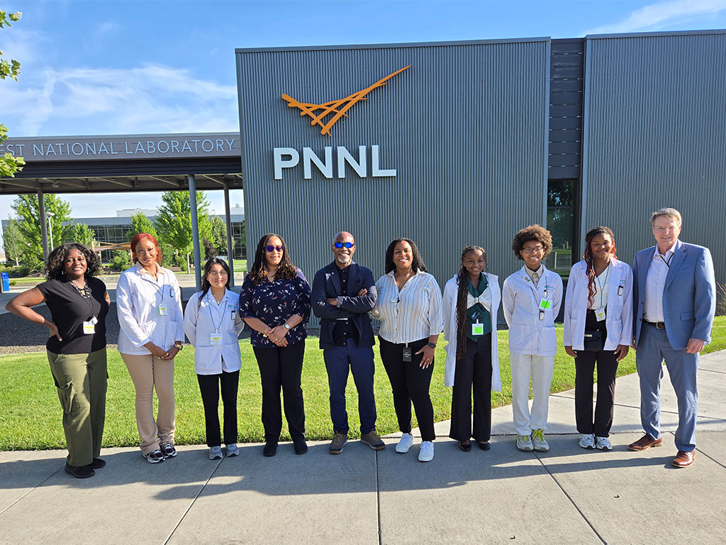 Florida A&M University School of the Environment students, faculty and staff pose for a group photo outside Pacific Northwest National Laboratory (PNNL) during a two-day educational visit that introduced students to cutting-edge research, advanced laboratory facilities and career opportunities in environmental science, energy and national security. (Photo courtesy of Joel Blount.)