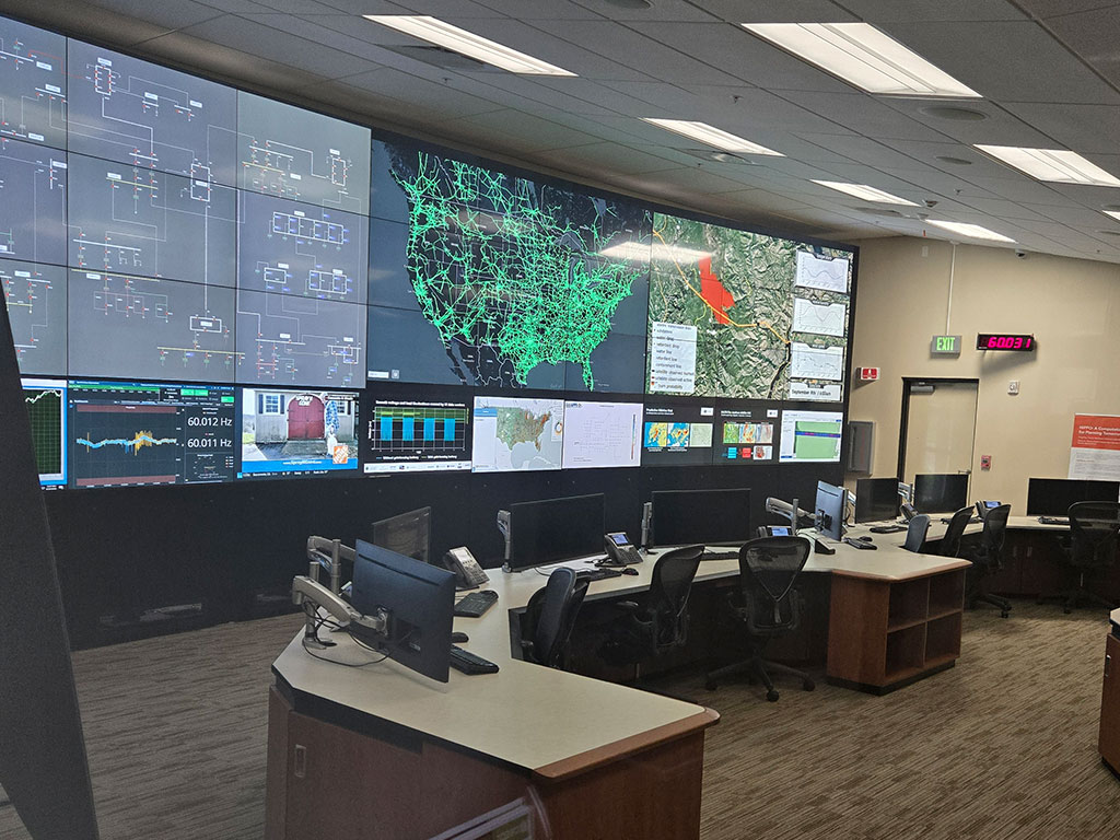 Students from Florida A&M University's School of the Environment tour the Grid Storage Launchpad at Pacific Northwest National Laboratory (PNNL), where researchers monitor and study the nation's electric power grid to advance energy resilience, reliability and innovation.