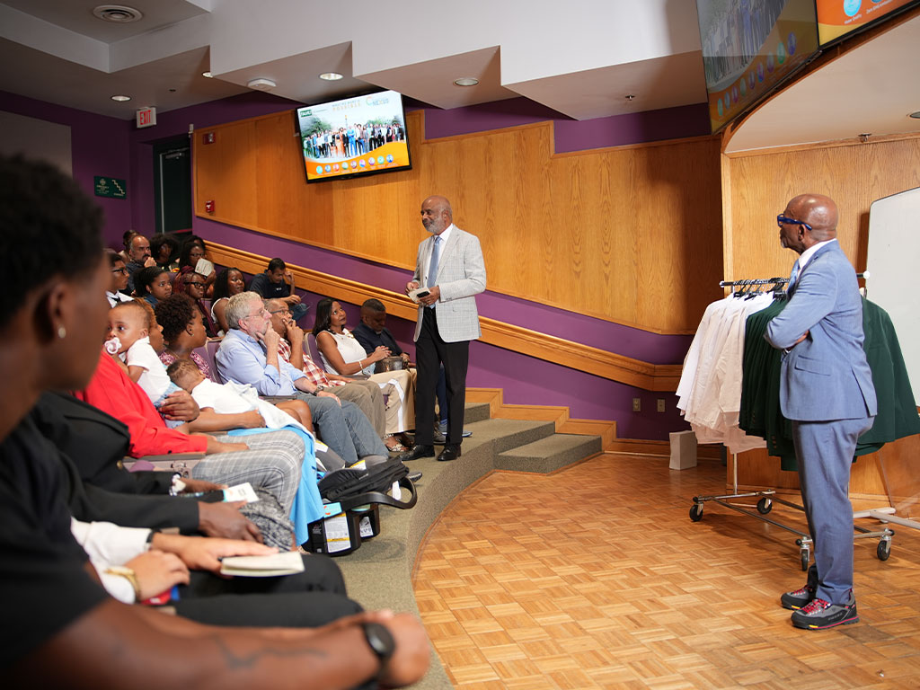 Former Florida A&M University President Larry Robinson, Ph.D., addresses attendees as School of the Environment Dean Victor Ibeanusi, Ph.D., D.h.c., looks on during the White Coat and Greening Ceremony
