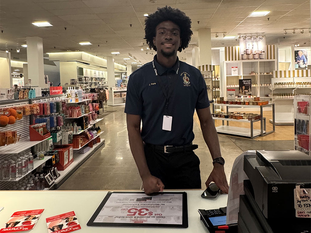 FAMU fourth-year accounting student Jerome Parris of Miami participates in the Suit Up JCPenney event at Governor’s Square Mall in Tallahassee. Parris, who first attended the event in 2023, returned this year as a volunteer with the Omega Xi Chapter of Alpha Kappa Psi. (Photo courtesy FAMU Communications)