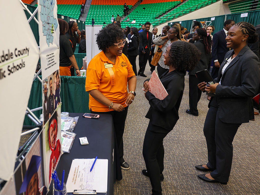 Florida A&M University students engage with an employer during a Career and Internship Expo at the Al Lawson Multipurpose Center. The Expo connects students with employers and opportunities for internships and future careers. (Photo courtesy FAMU Communications)