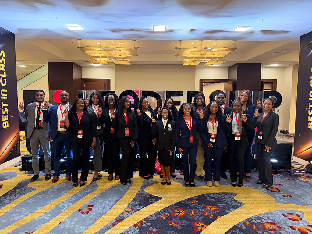 Florida A&M University students dressed in professional attire pose for a group photo at a 2026 Thurgood Marshall College Fund event. The delegation represented FAMU while participating in an experience centered on leadership, professional growth and networking.