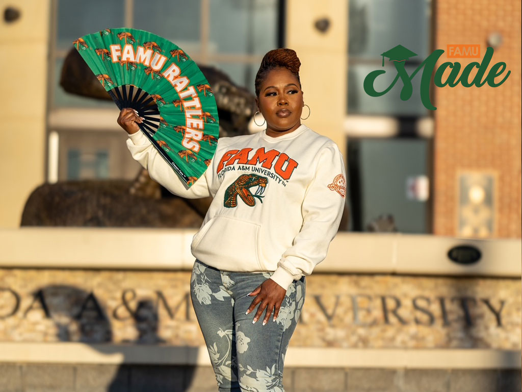 Vanessa with FAMU fan in front of rattler