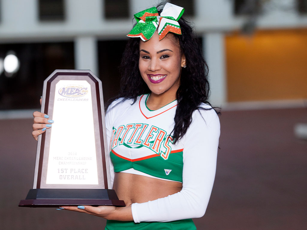 Florida A&M University alumna Nyeja Skye Warner celebrates a championship win during her time as a FAMU cheerleader, an experience that helped shape her path into athletics leadership. (Photo Courtesy: Nyeja Skye Warner)