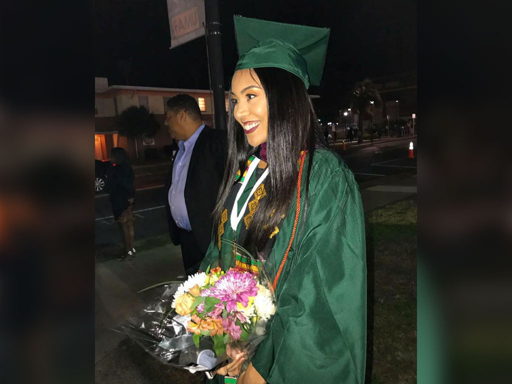 Nyeja Skye Warner smiles following her graduation ceremony, a moment that set the foundation for her career in athletics and communications. (Photo Courtesy: Nyeja Skye Warner)