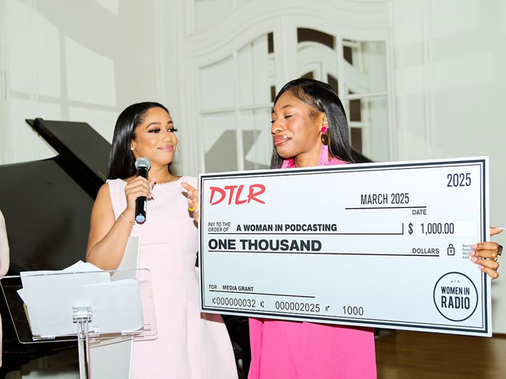 Winner recieves a big check