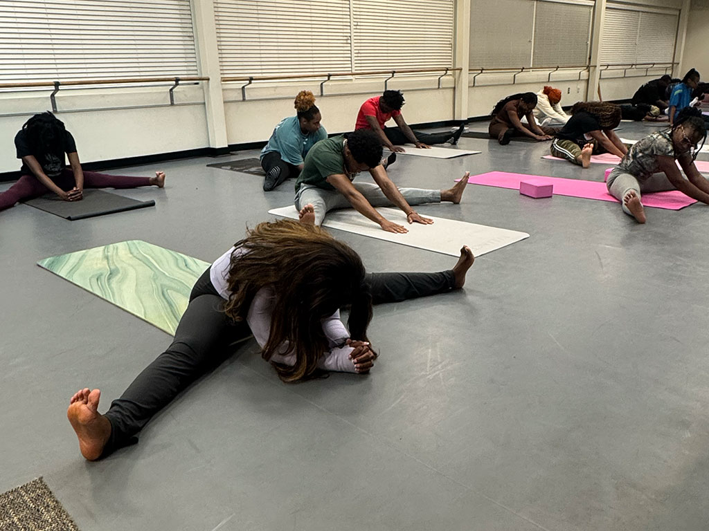 For students juggling academics, work and life, the yoga elective offers a sanctuary for mindfulness, growth and connection.
