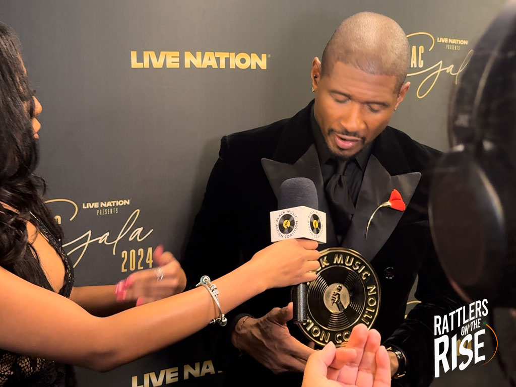 Zaria pictureds while interviewing Usher.