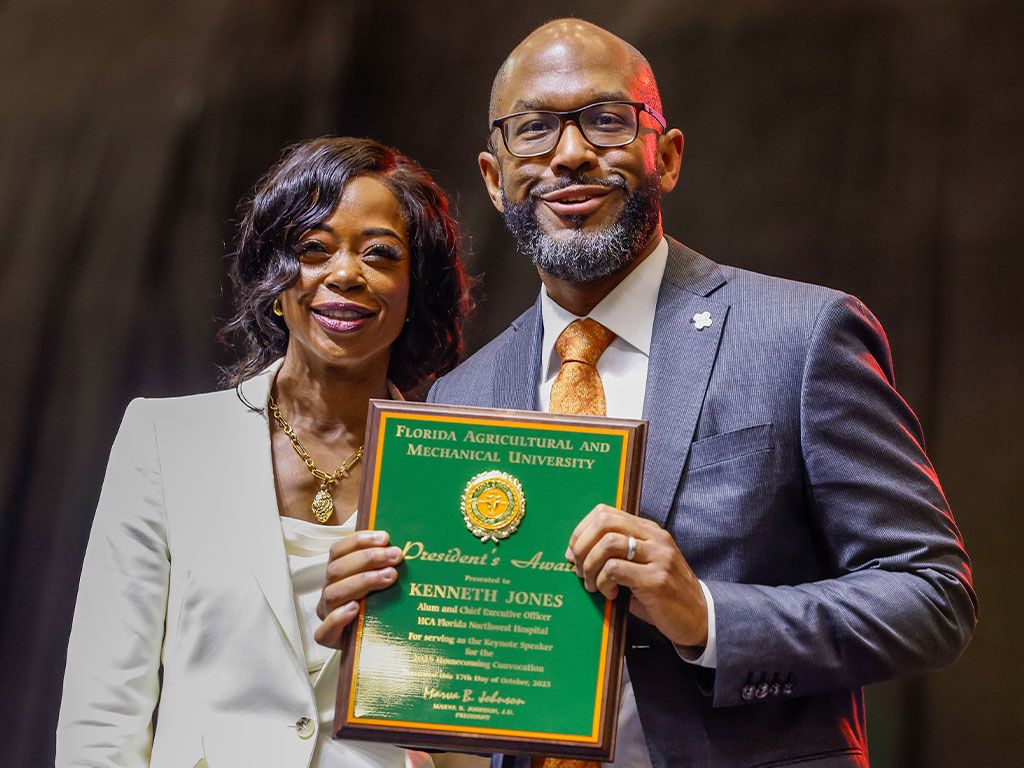 President Marva Johnson and keynote speaker Kenneth Jones celebrate a successful Homecoming Convocation honoring FAMU’s legacy of leadership and excellence. President Marva Johnson with speaker Kenneth Jones