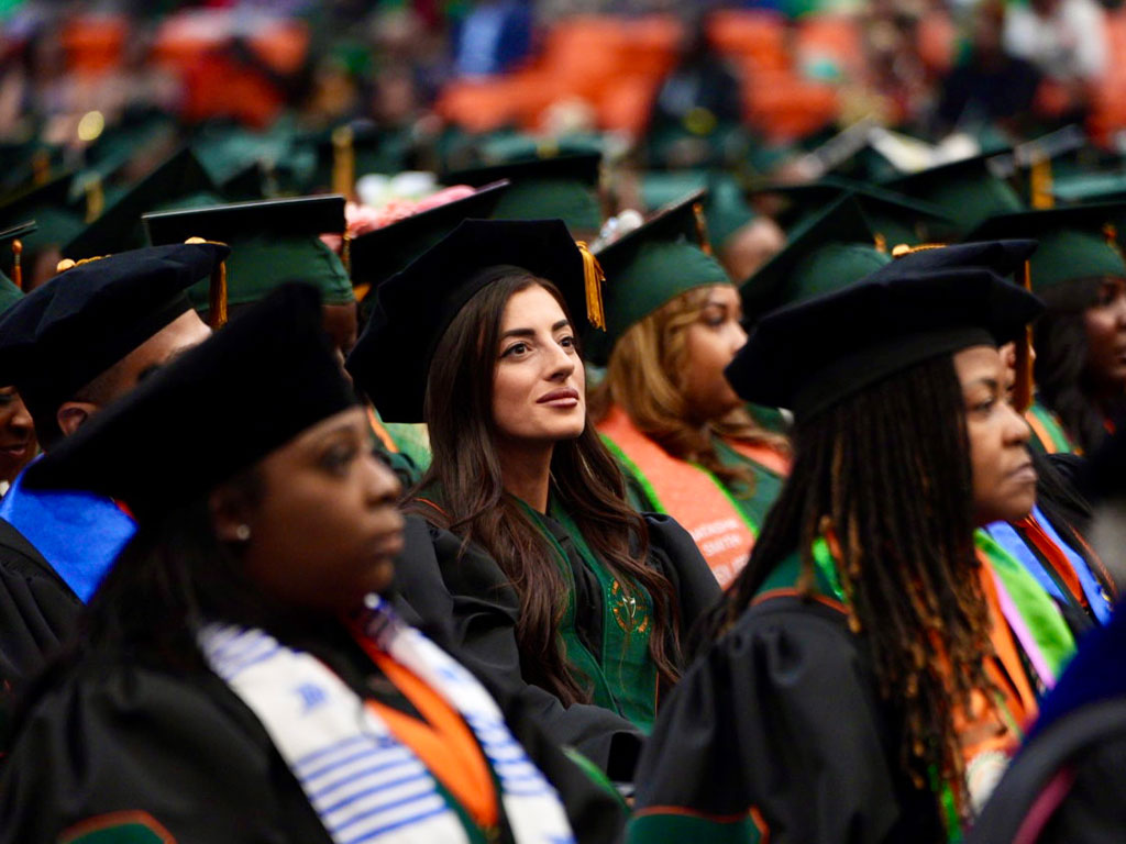 Young woman in commencement audience