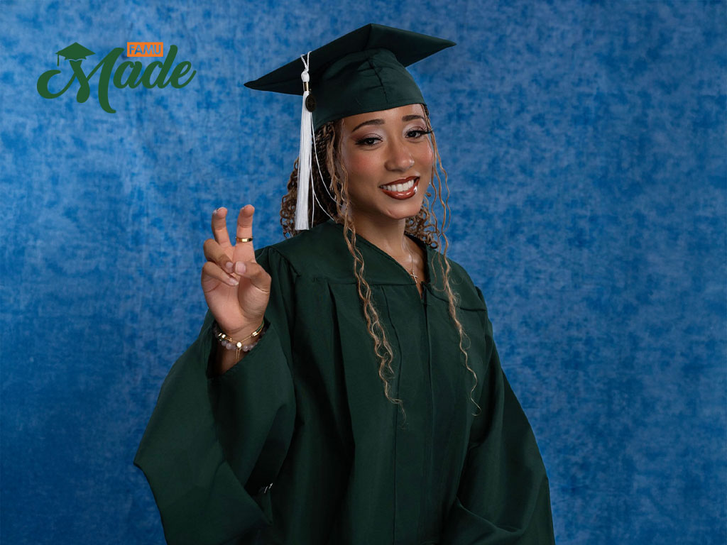 Alyssa Marie Summers in her green cap and gown.