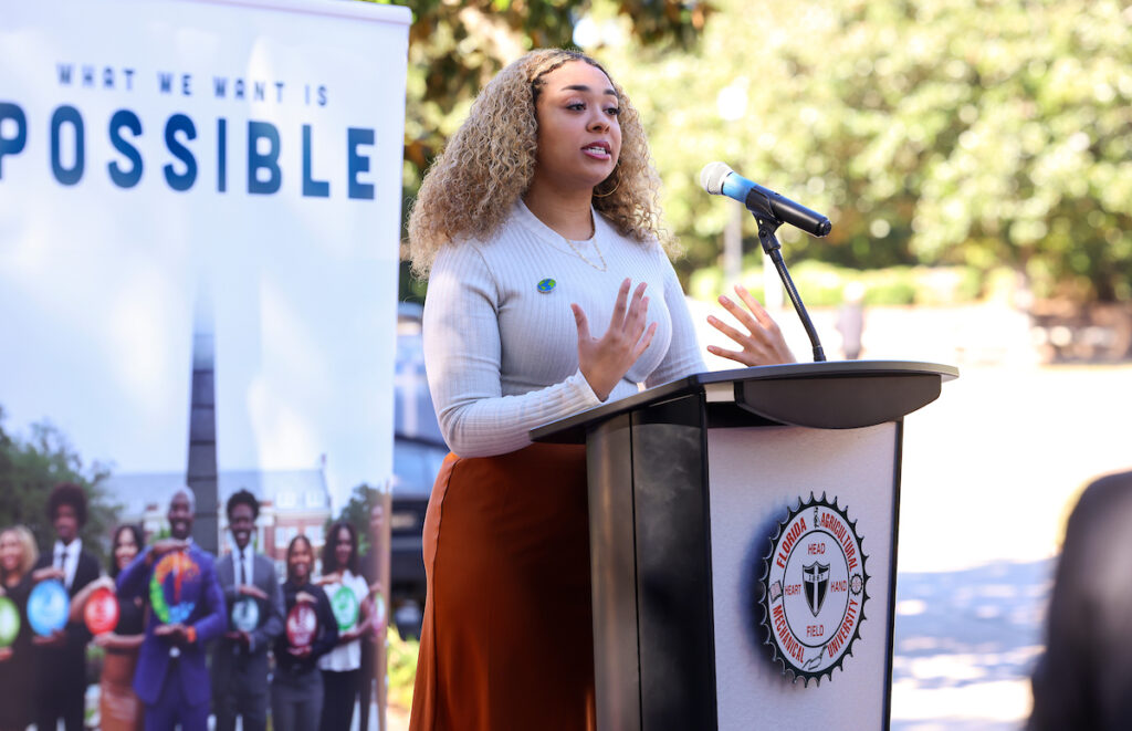 Florida A&M University School of the Environment alumna Autumn Dancy addresses attendees during a speaking engagement. Now a meteorologist for WCJB ABC 20 in Gainesville, Dancy says her FAMU education provided the scientific foundation and communication skills she uses daily to inform the public about weather and environmental conditions. 